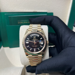 RC Factory Day-Date 40 yellow gold baguette diamond-style dial with fluted bezel