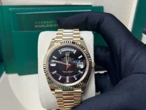 RC Factory Day-Date 40 yellow gold baguette diamond-style dial with fluted bezel