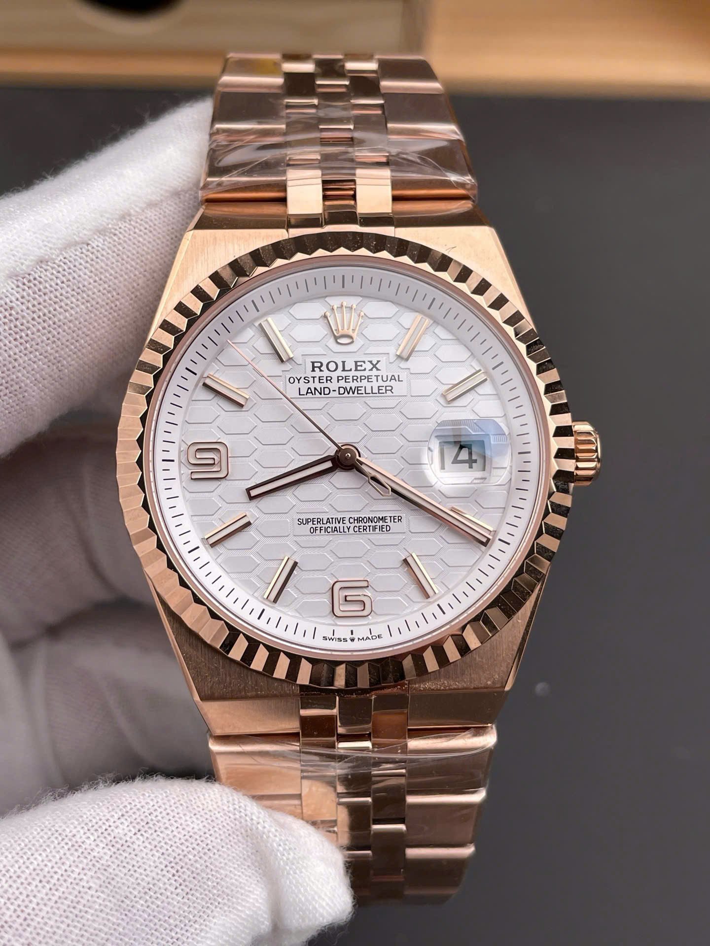 ES Factory Rolex Land-Dweller replica rose gold 40mm white honeycomb dial watch